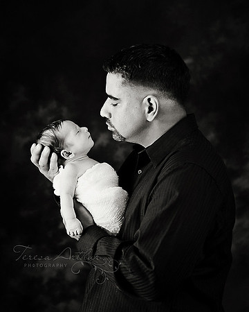 Dad and Newborn Son