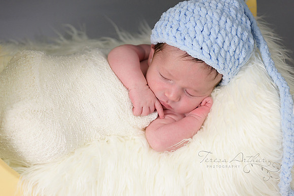 Sleepy newborn portrait