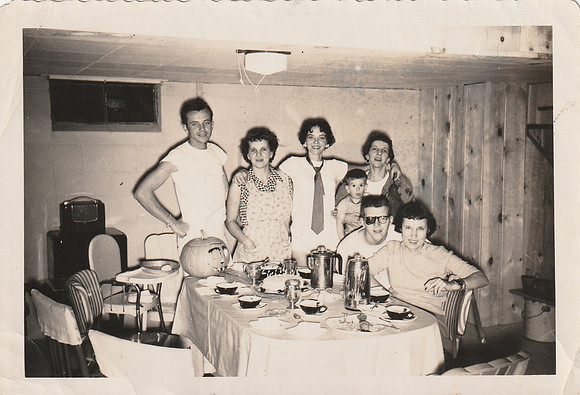 Dad and family Halloween time 1950s