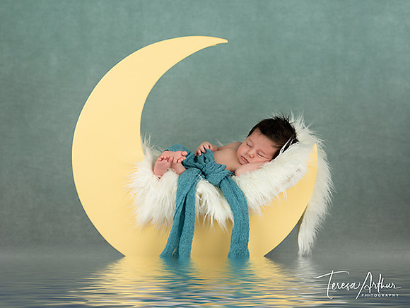 NEWBORN PHOTOGRAPHERS IN NORTHERN VIRGINIA-BABY IN MOON PROP-TERESA ARTHUR PHOTOGRAPHY-WARRENTON VA