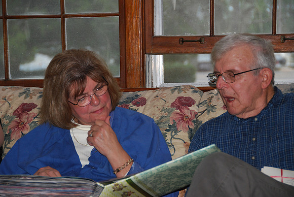 2009 John and Minnie Compton-looking at family genealogy book